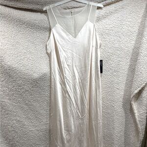 Elegant Cream Sleeveless Dress